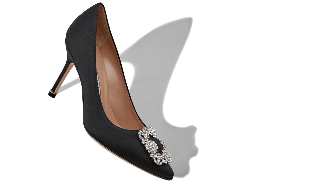 Noelle Dream Black Jewel Buckle Pumps – front three-quarter view showing black jewel buckle, crystal buckle, almond toe…