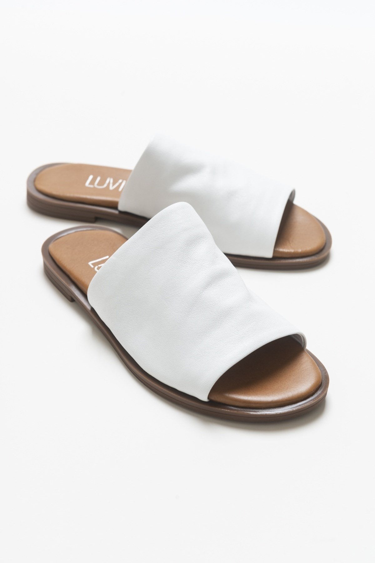 Clau - White Leather Sandal – front three-quarter view showing leather, white, SimmiUnique