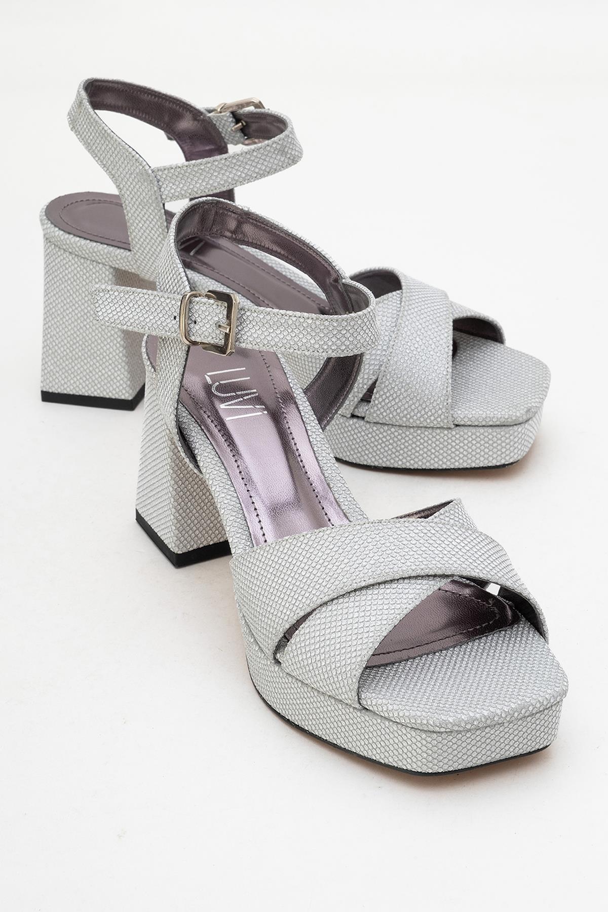 Lisbon - Silver Glitter Cross-Strap Platform Heel Shoe – front three-quarter view showing leather, glitter, silver…