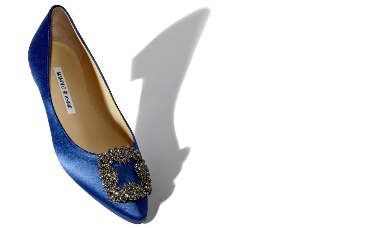 Arabella Bloom Blue Jewel Buckle Pumps – front three-quarter view showing blue jewel buckle, crystal buckle, almond toe…