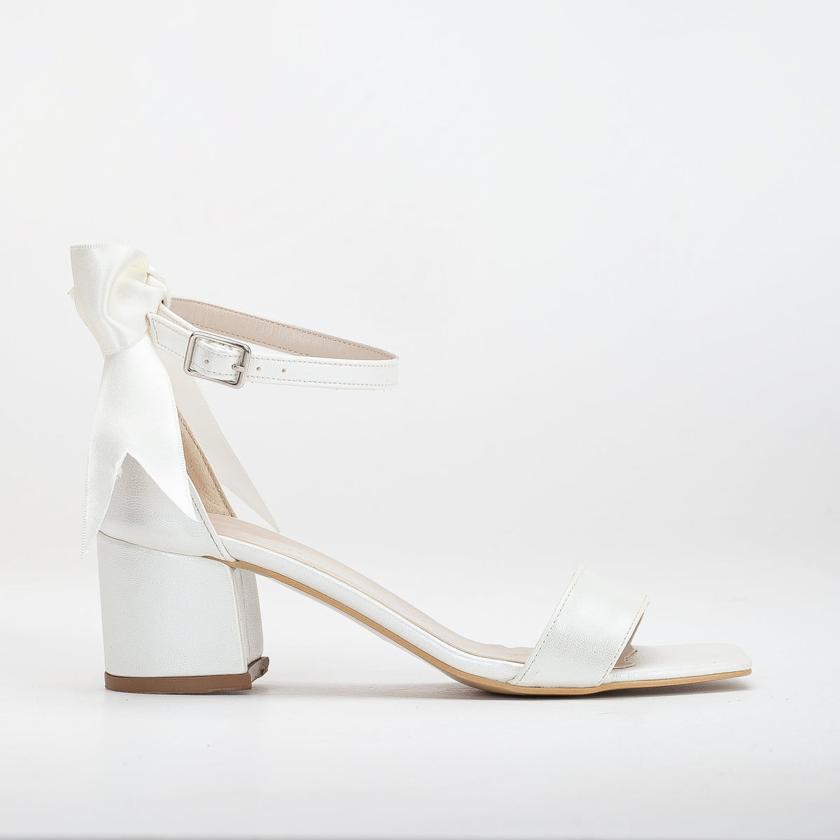 Rochelle - Ivory Bridal Sandals with Ribbon – front three-quarter view showing bow, satin, leather, SimmiUnique