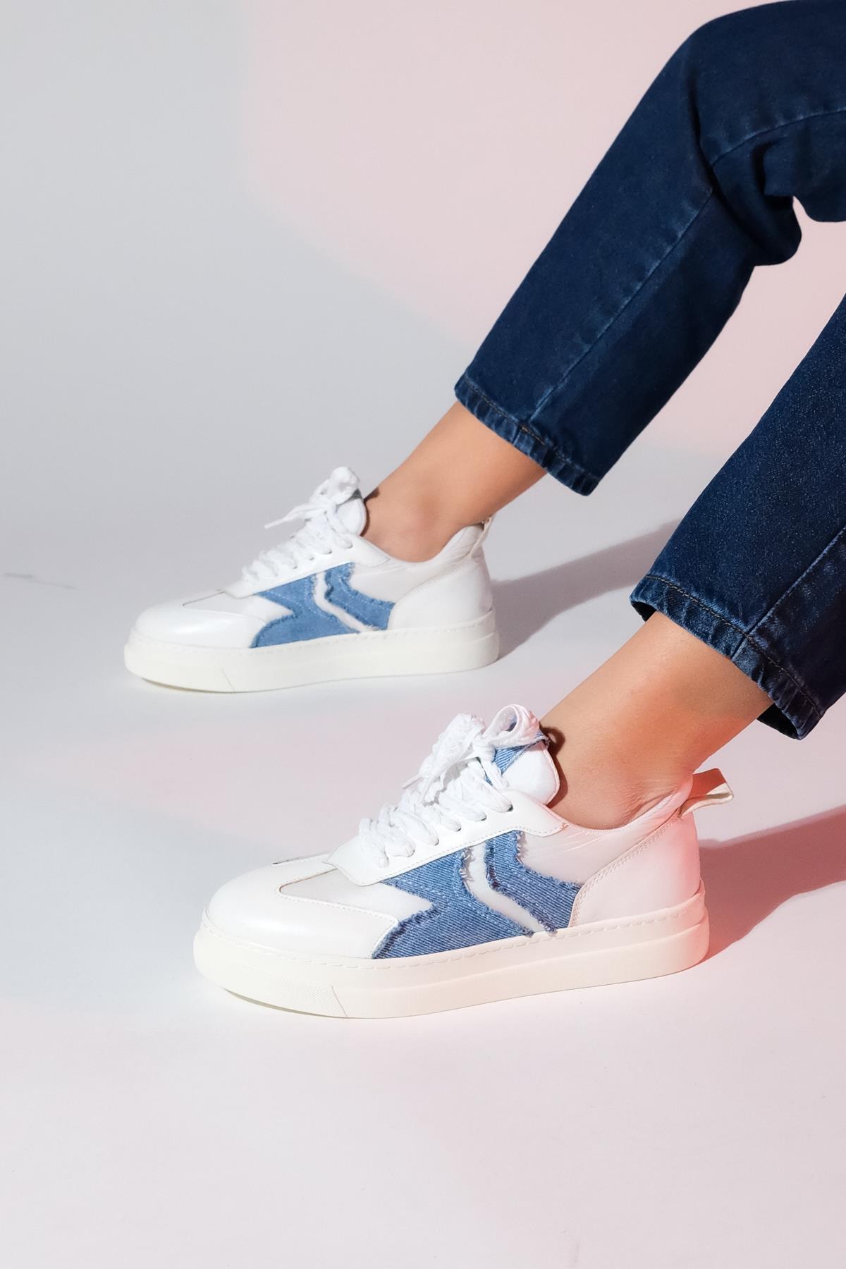 Sande - White Denim Detail Sport Sneaker – front three-quarter view showing leather, white, SimmiUnique