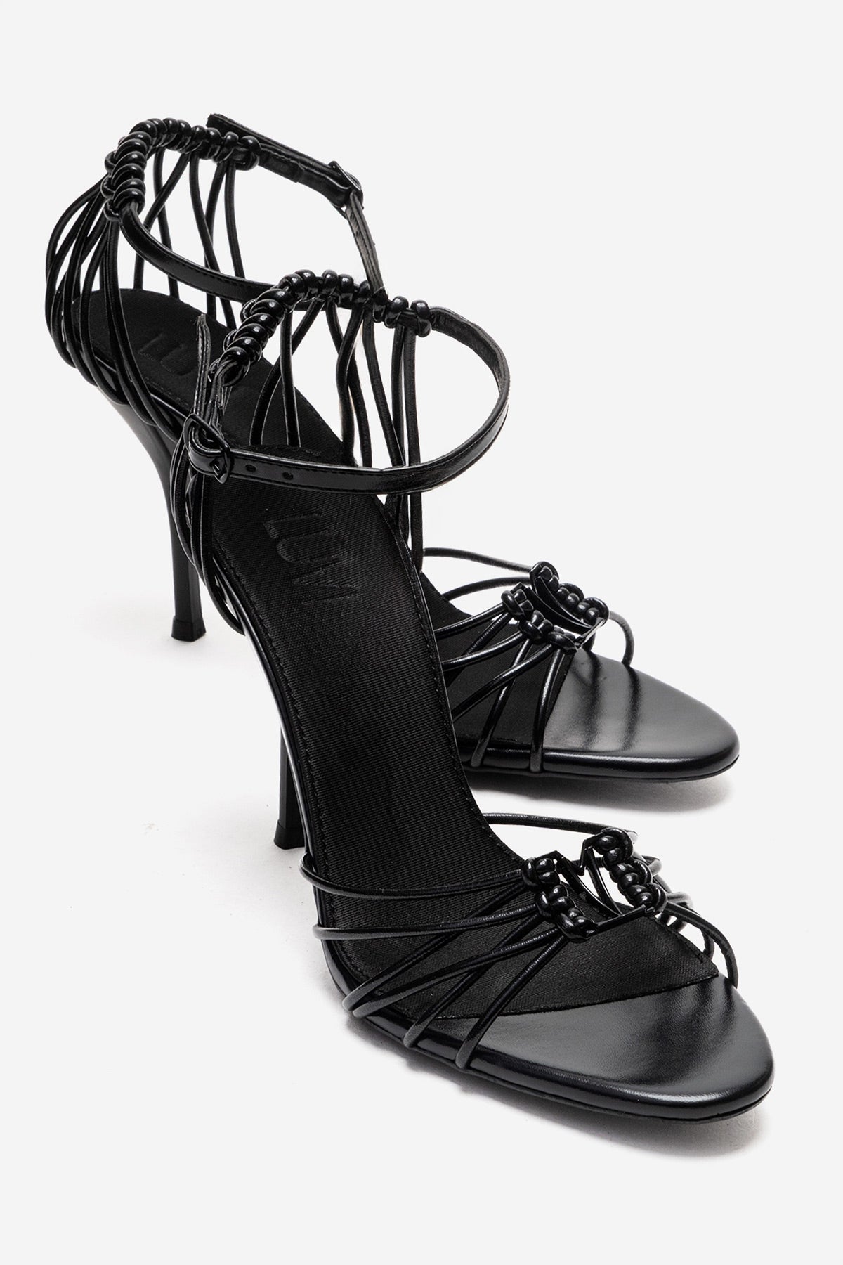 ARONA - Black Genuine Leather Stiletto Heel Shoe – front three-quarter view showing leather, black, SimmiUnique