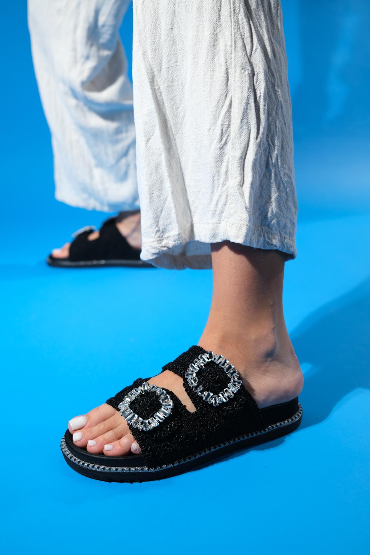 Dungeon - Black Knit Double Strap Stone Buckle Slide – front three-quarter view showing leather, black, SimmiUnique