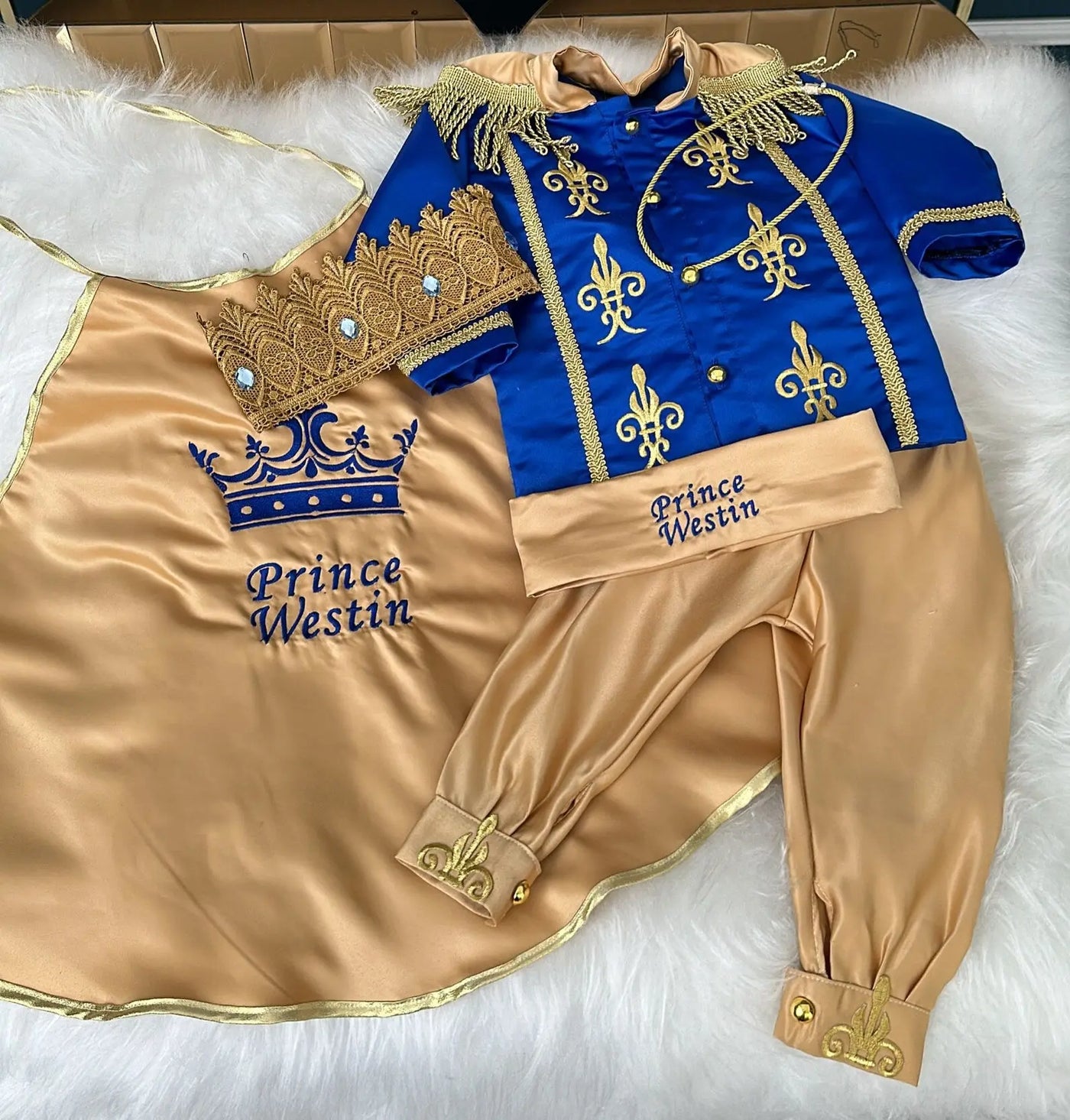 Prince William baby boy costume gold and blue detail