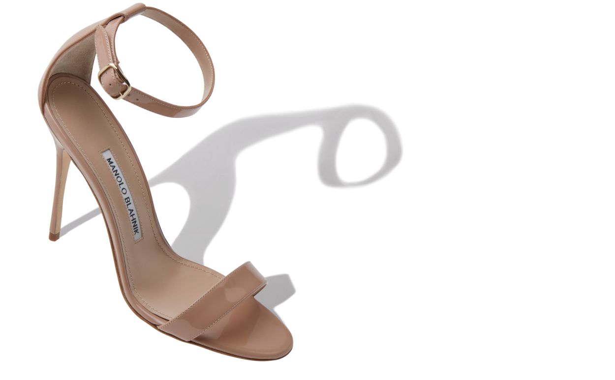 Noelle Grace Neutral Ankle Strap Ankle-Strap Shoes – front three-quarter view showing neutral ankle strap, patent leather…