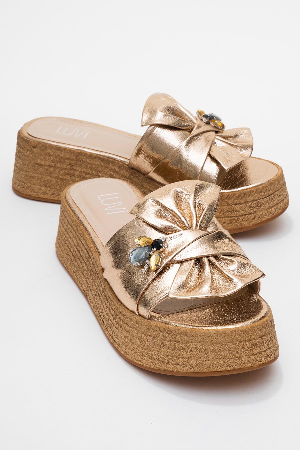 Shara Gold Bow & Bee Buckle Platform Sandal – front three-quarter view showing bow, leather, gold, SimmiUnique