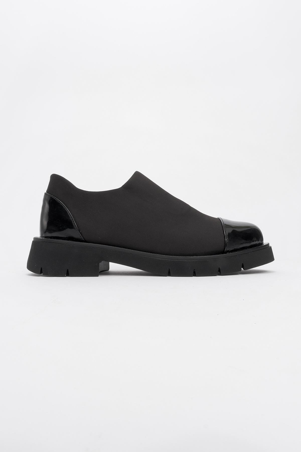 Panola - Black Patent Scuba Everyday Shoe – heel view showing leather, black, SimmiUnique