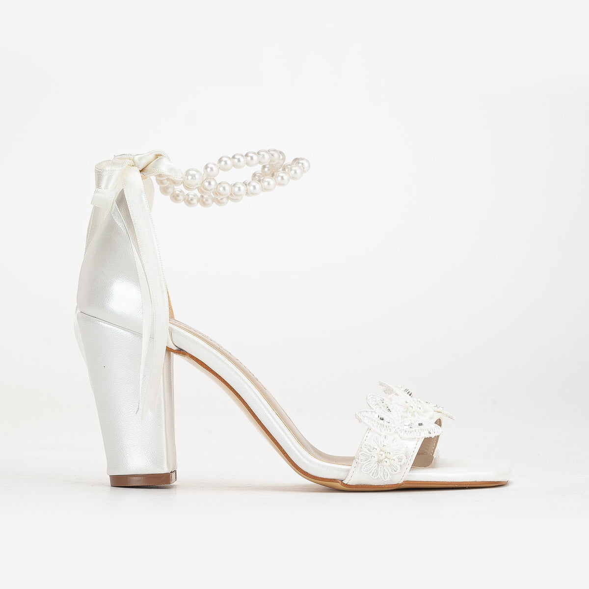Helene - Ivory Lace Bridal Heels with Pearls – front three-quarter view showing pearl, lace, leather, SimmiUnique