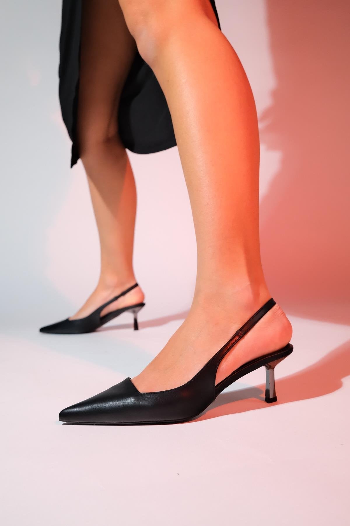 Marten - Black Pointed Toe Backless Stiletto Pump – front three-quarter view showing leather, black, SimmiUnique