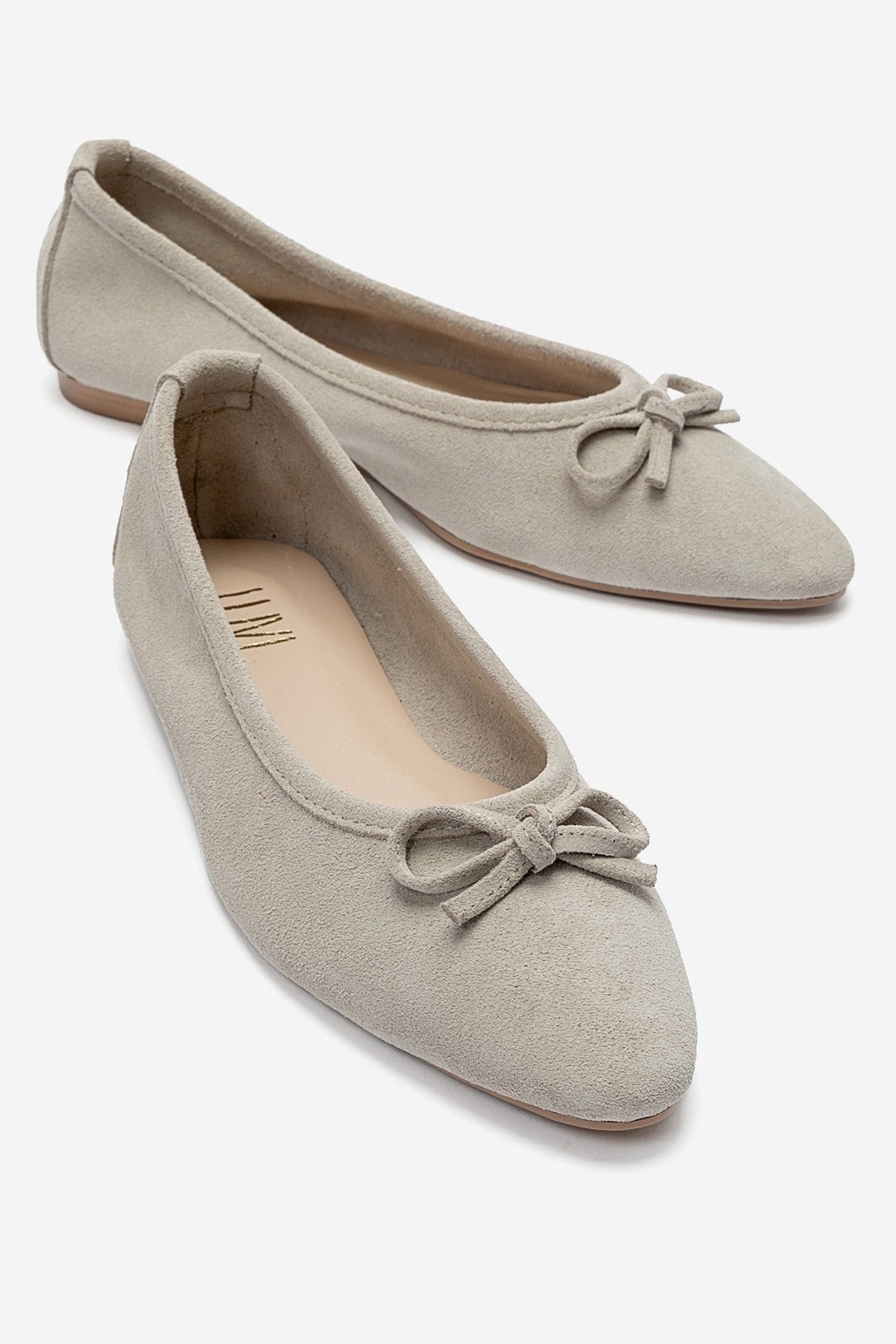 UMIEL - Beige Genuine Leather Bow Ballet Flat – front three-quarter view showing bow, leather, suede, SimmiUnique