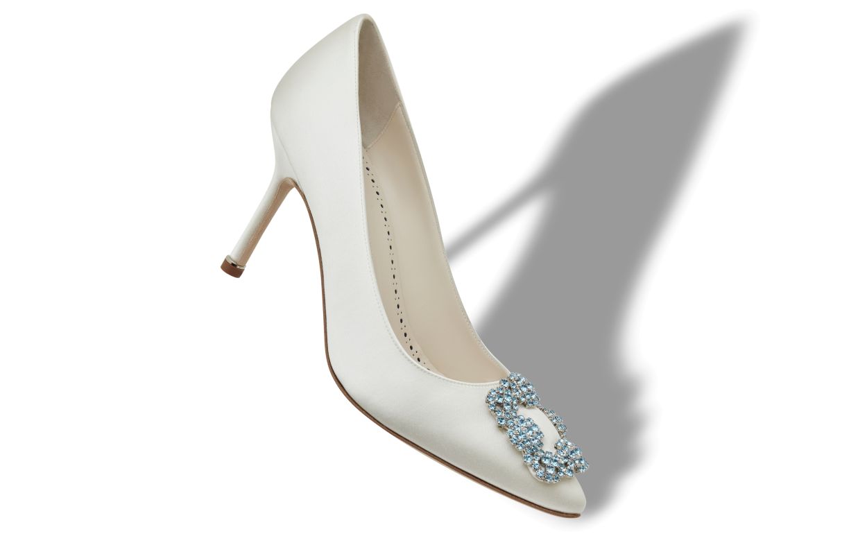 Ophelia Crown White Jewel Buckle Pumps – front three-quarter view showing white jewel buckle, crystal buckle, almond toe…